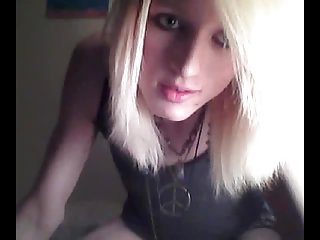 Platinum blonde emo tgirl does a bit of softcore posing